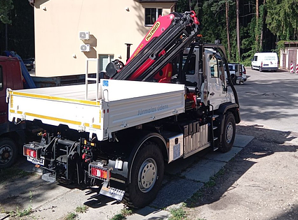 ПОДЪЕМНЫЕ КРАНЫ - UNIMOG celtņa/traktora noma